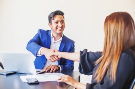 onboarding process | business man shaking new employee hand