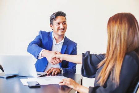 onboarding process | business man shaking new employee hand