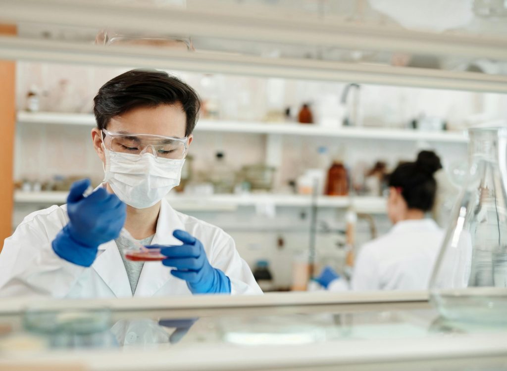 pharmaceutical staffing agency - pharmacist working on medical solution
